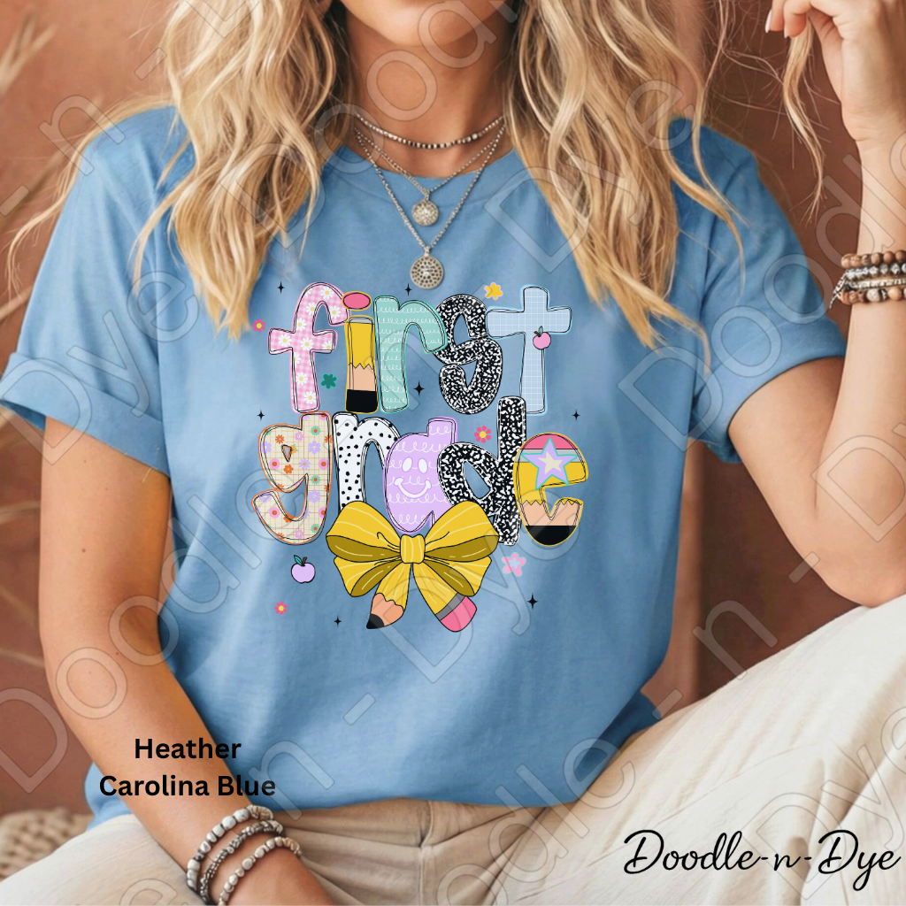 First Grade Teacher Shirt with Pencil Bow – Bella + Canvas Back‑to‑School Tee for Teachers, Staff, Classroom Prep & First‑Day Outfits