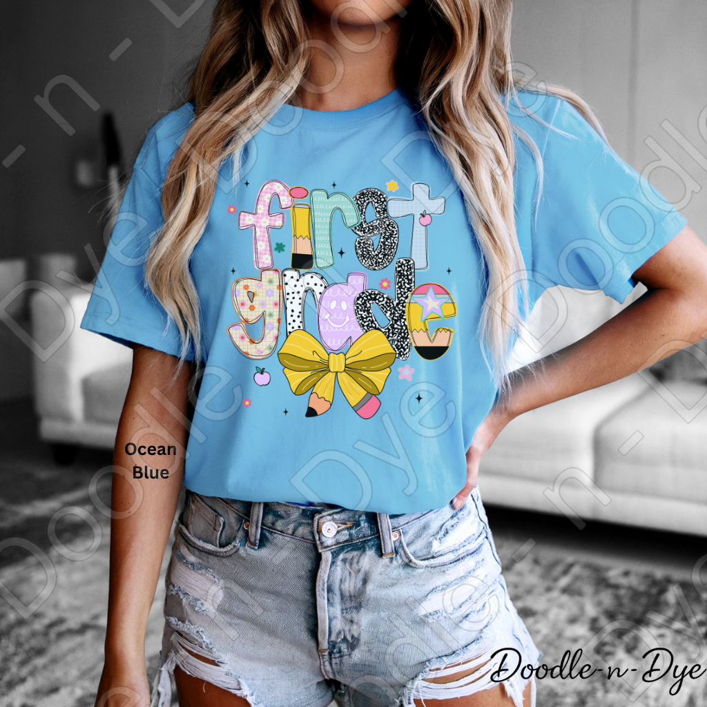 First Grade Teacher Shirt with Pencil Bow – Bella + Canvas Back‑to‑School Tee for Teachers, Staff, Classroom Prep & First‑Day Outfits